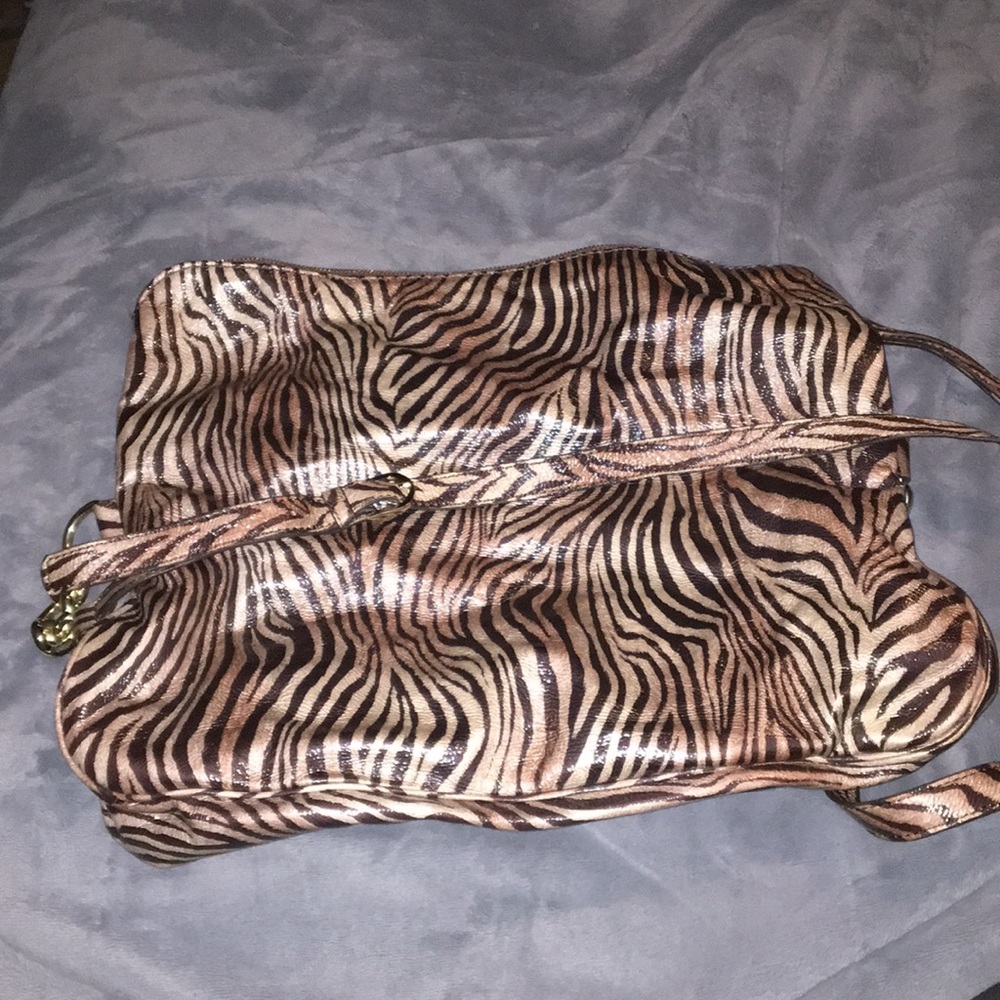 Guess Zebra large guess fold over cross body bag